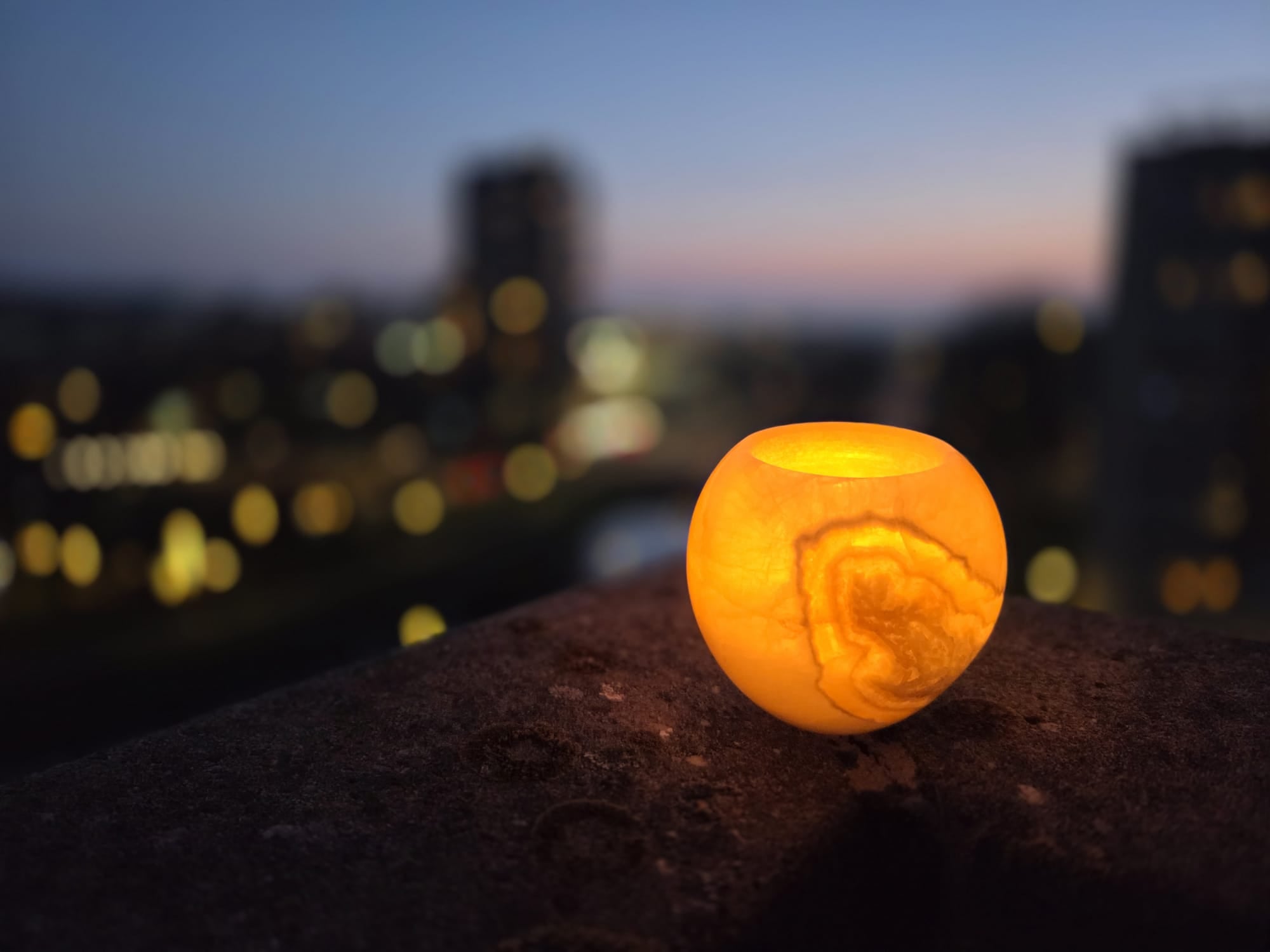 orb egyptian alabaster tealight holder glowing cityscape